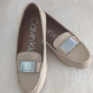 Calvin Klein Women's Beige Loafers with Silver Accent